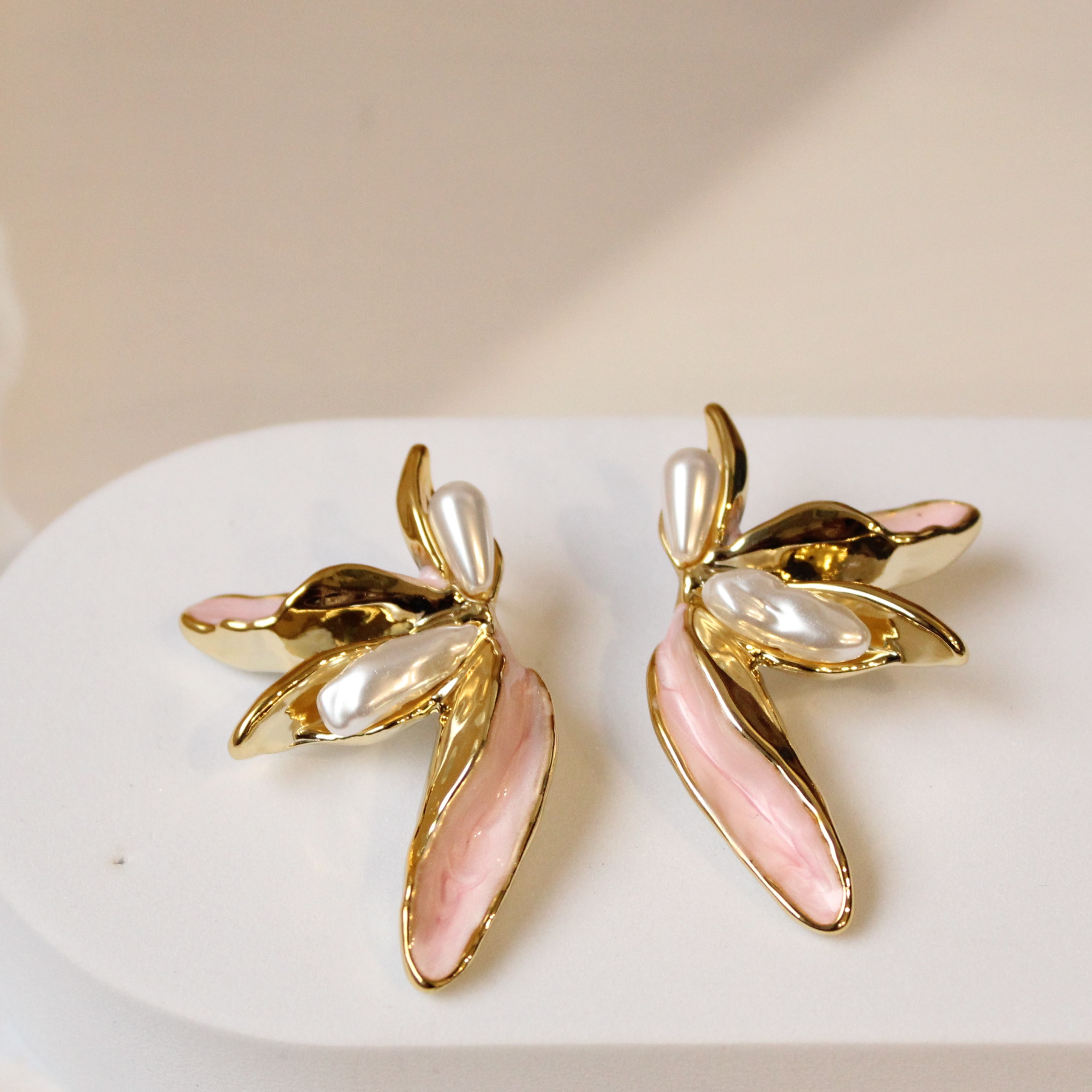 Pink butterfly studs