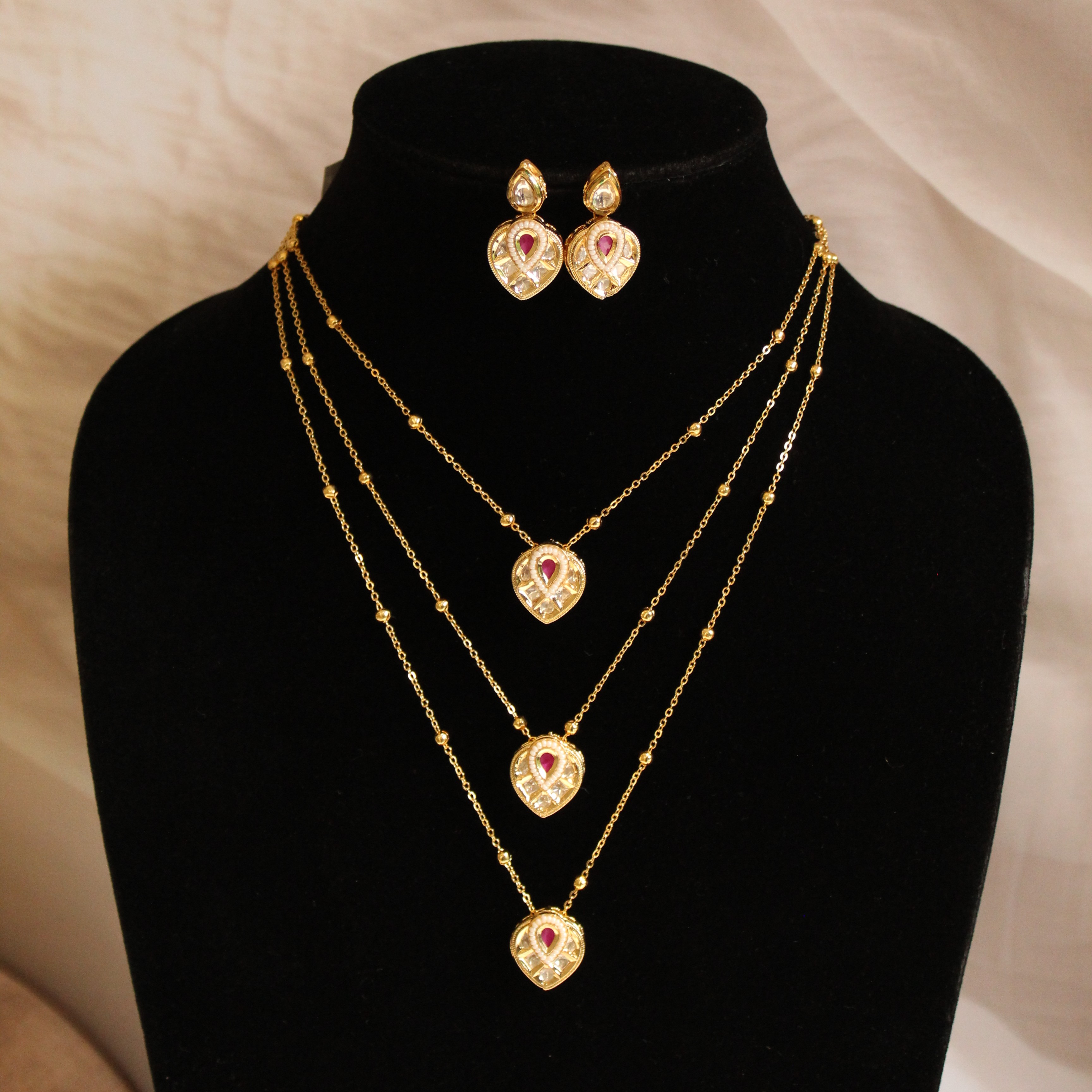 three layered kundan pendent set