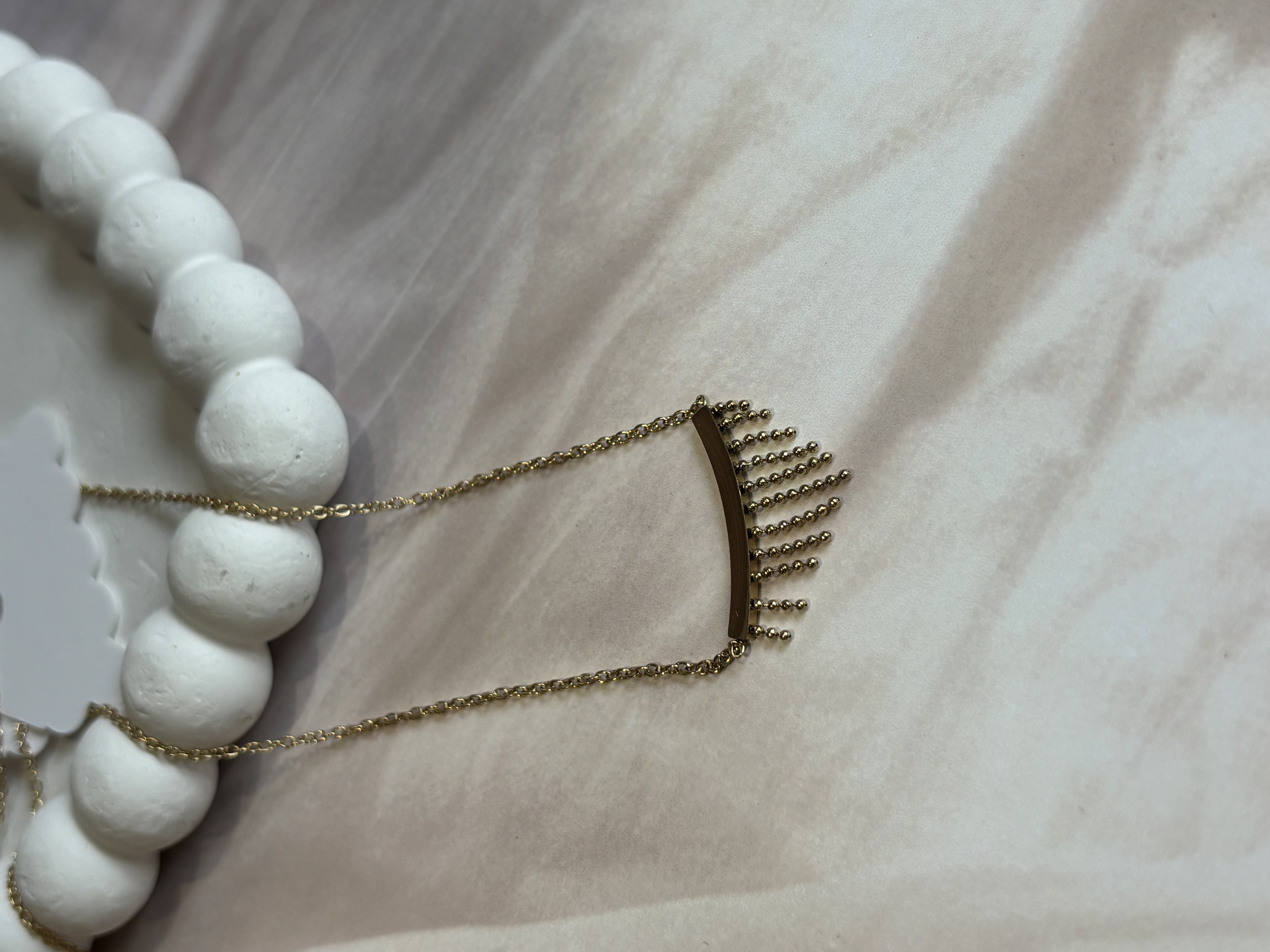 Golden fringe pendant