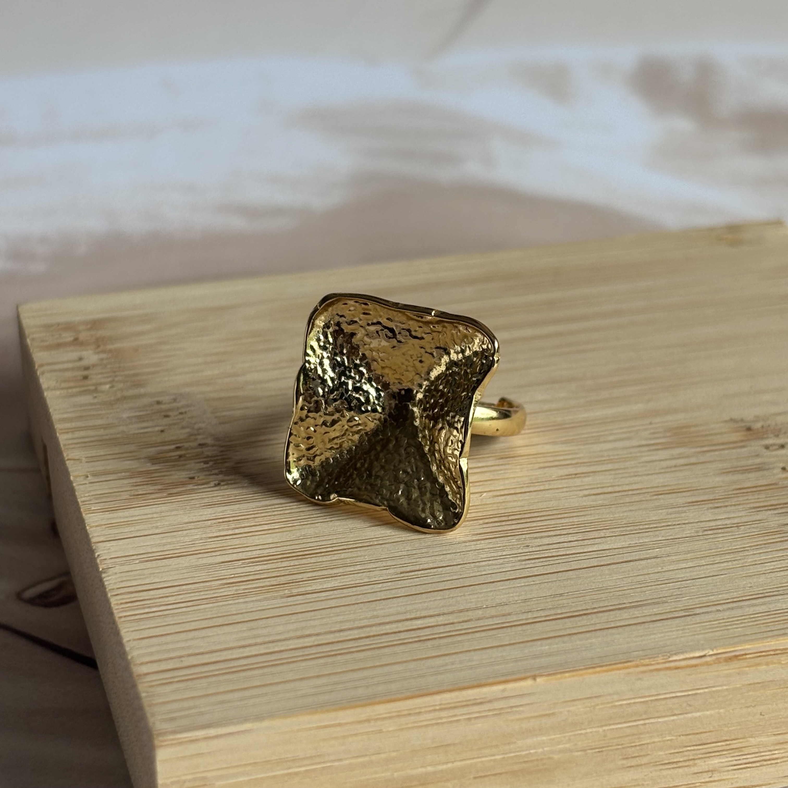 Golden 3D geometric design ring