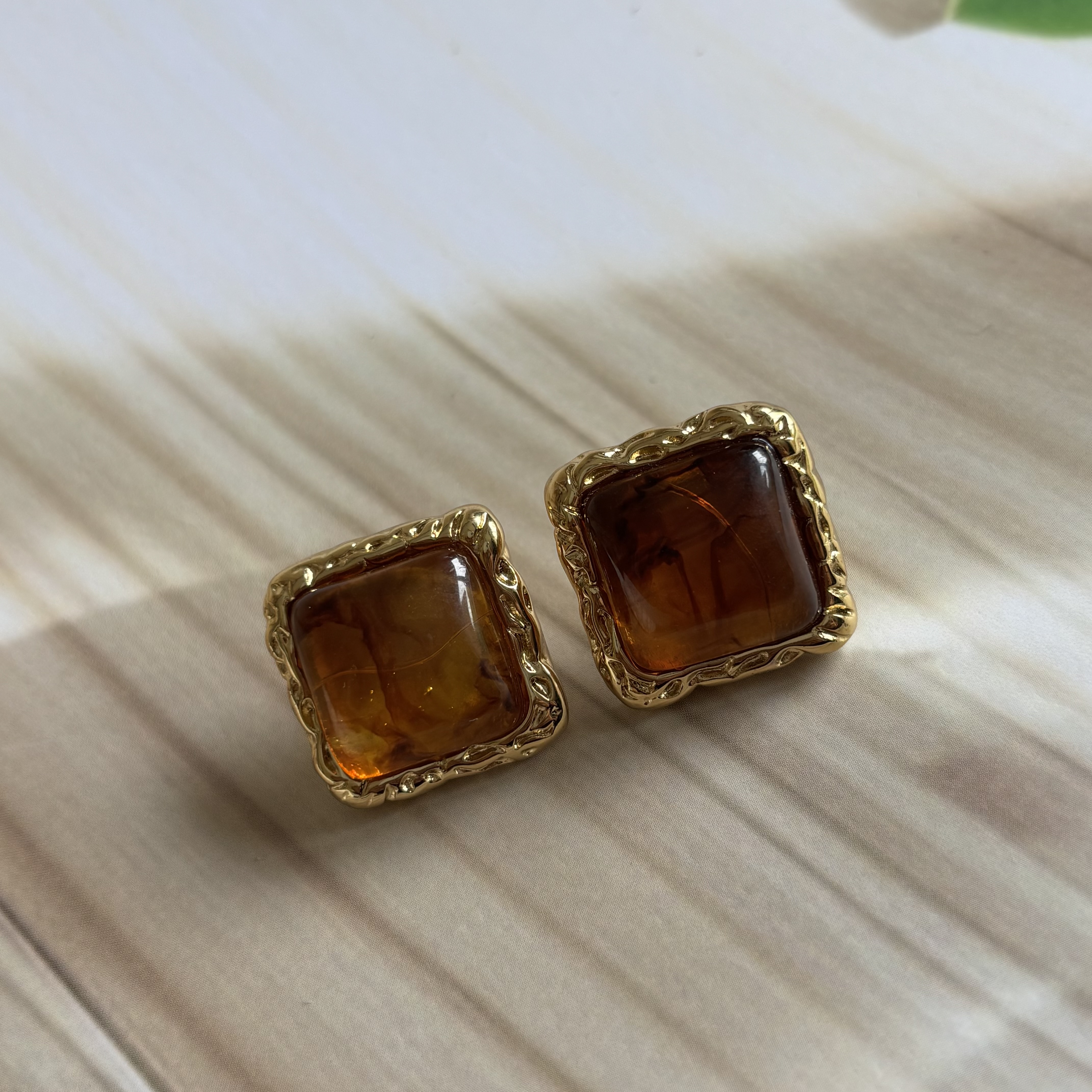 Brown square studs