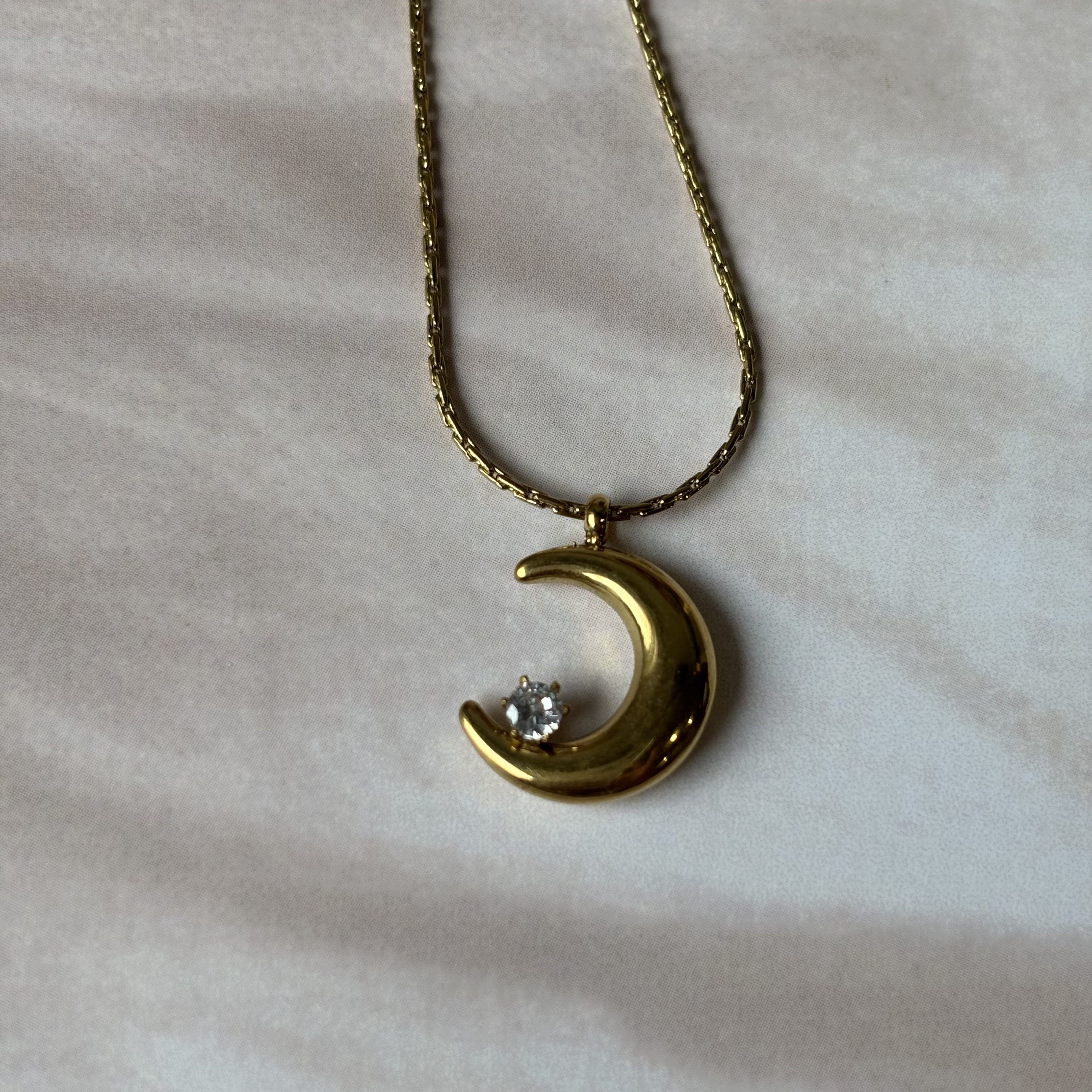 Crescent moon pendant