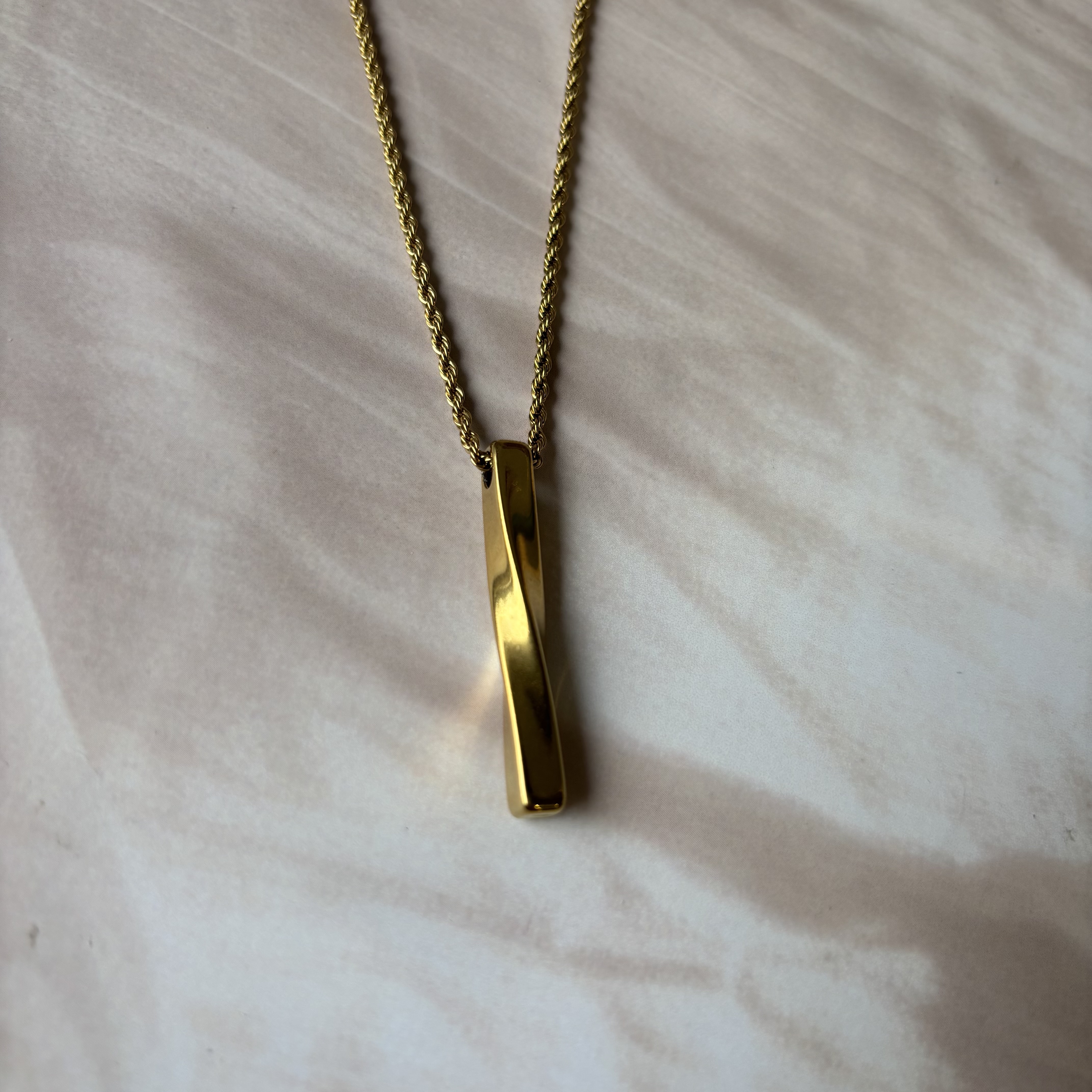 Twisted bar pendant-unisex