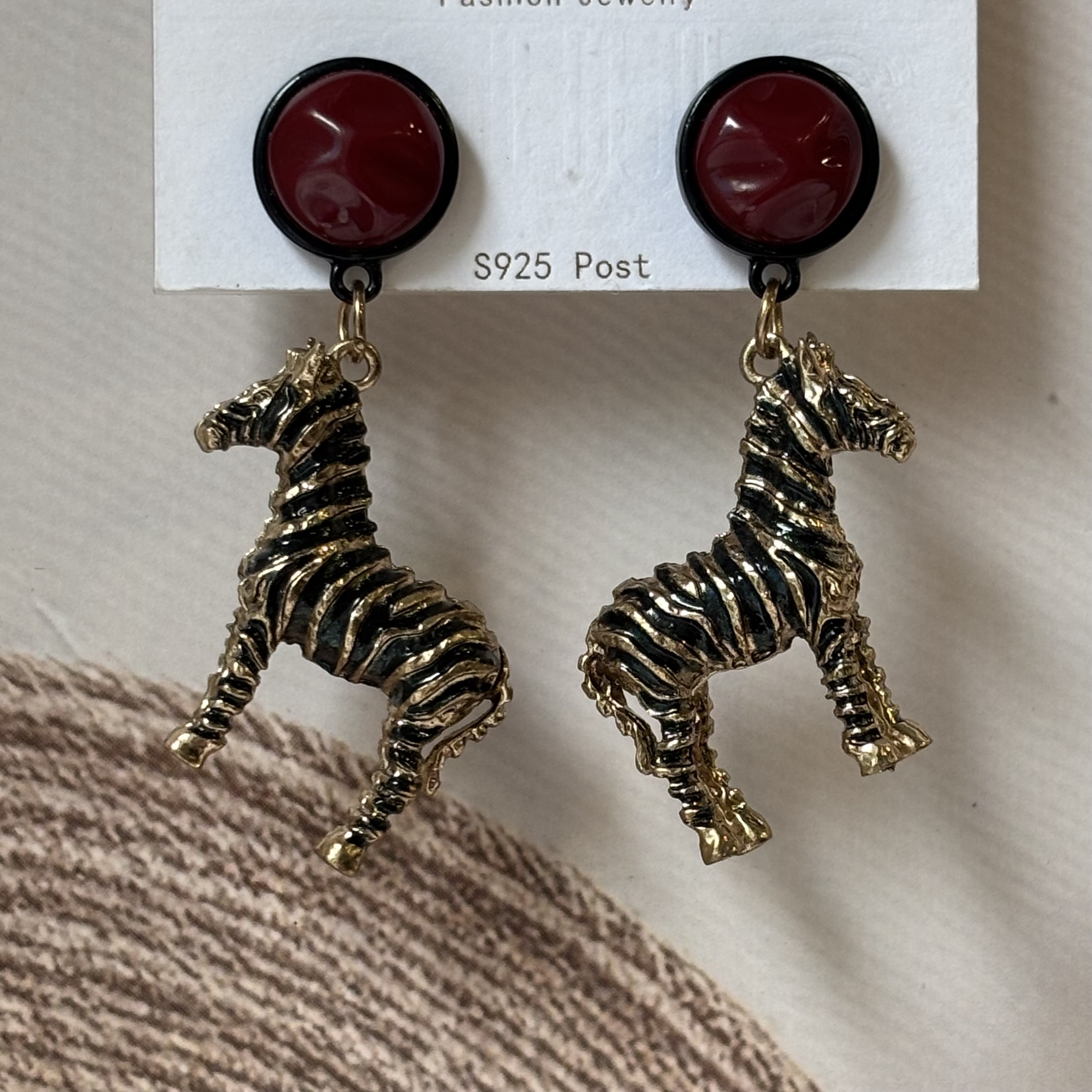 Hanging zebra earrings