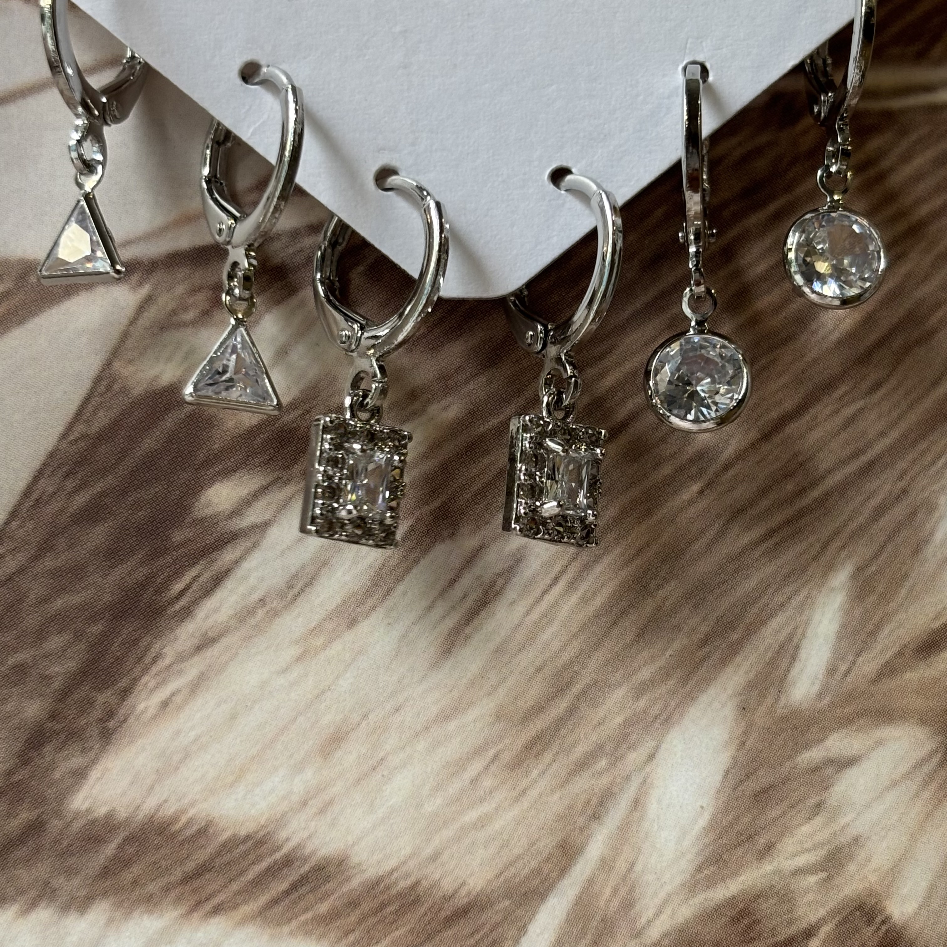 3 pairs of silver earrings