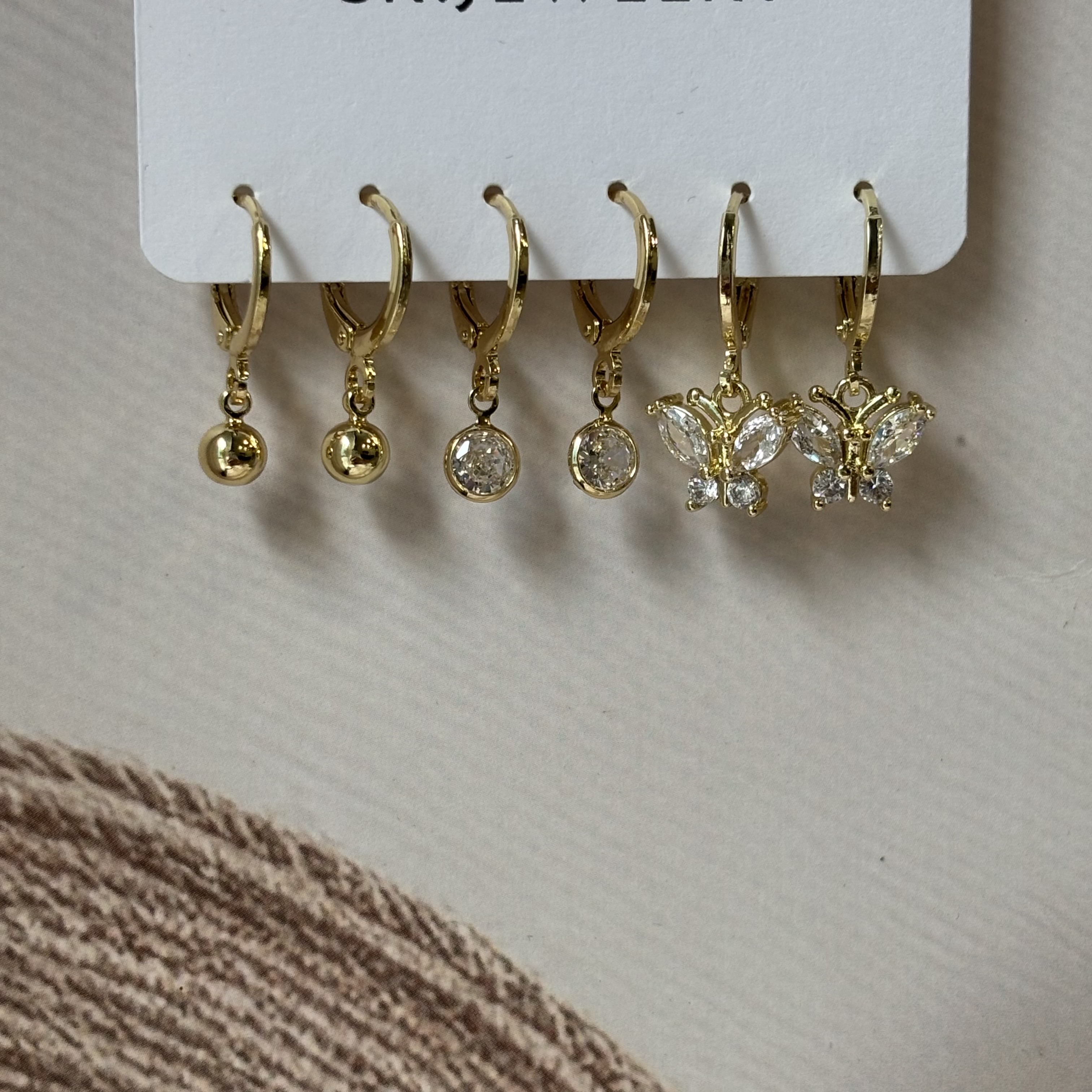 3 pairs of golden earrings- butterfly