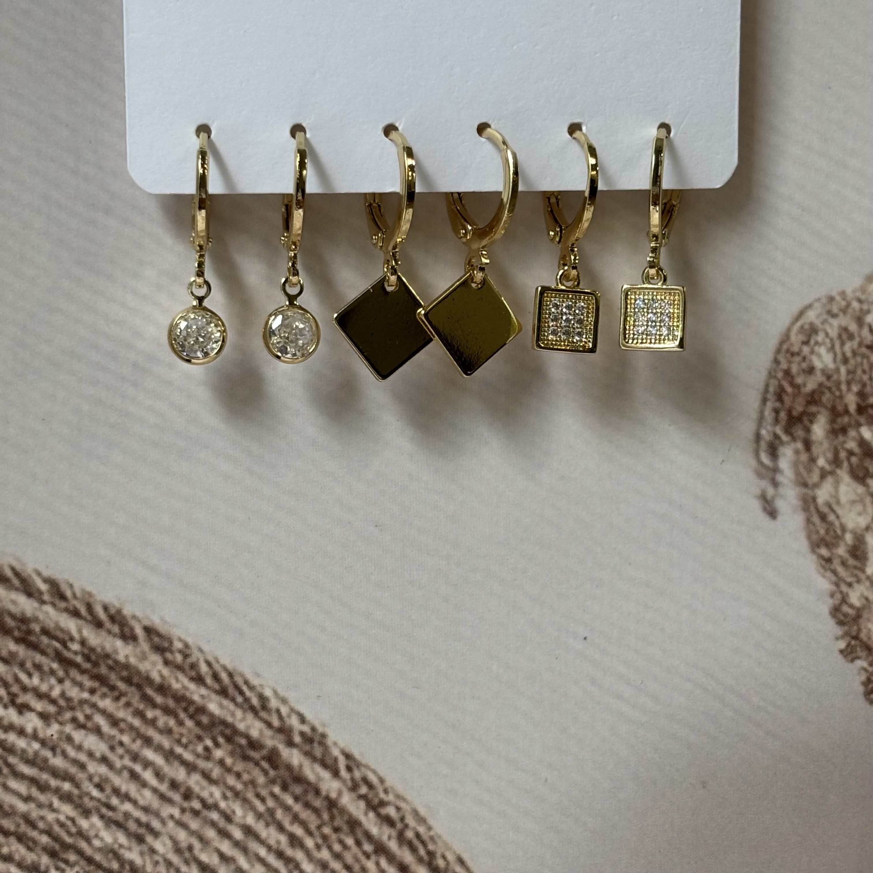 3 pairs of golden earrings- square