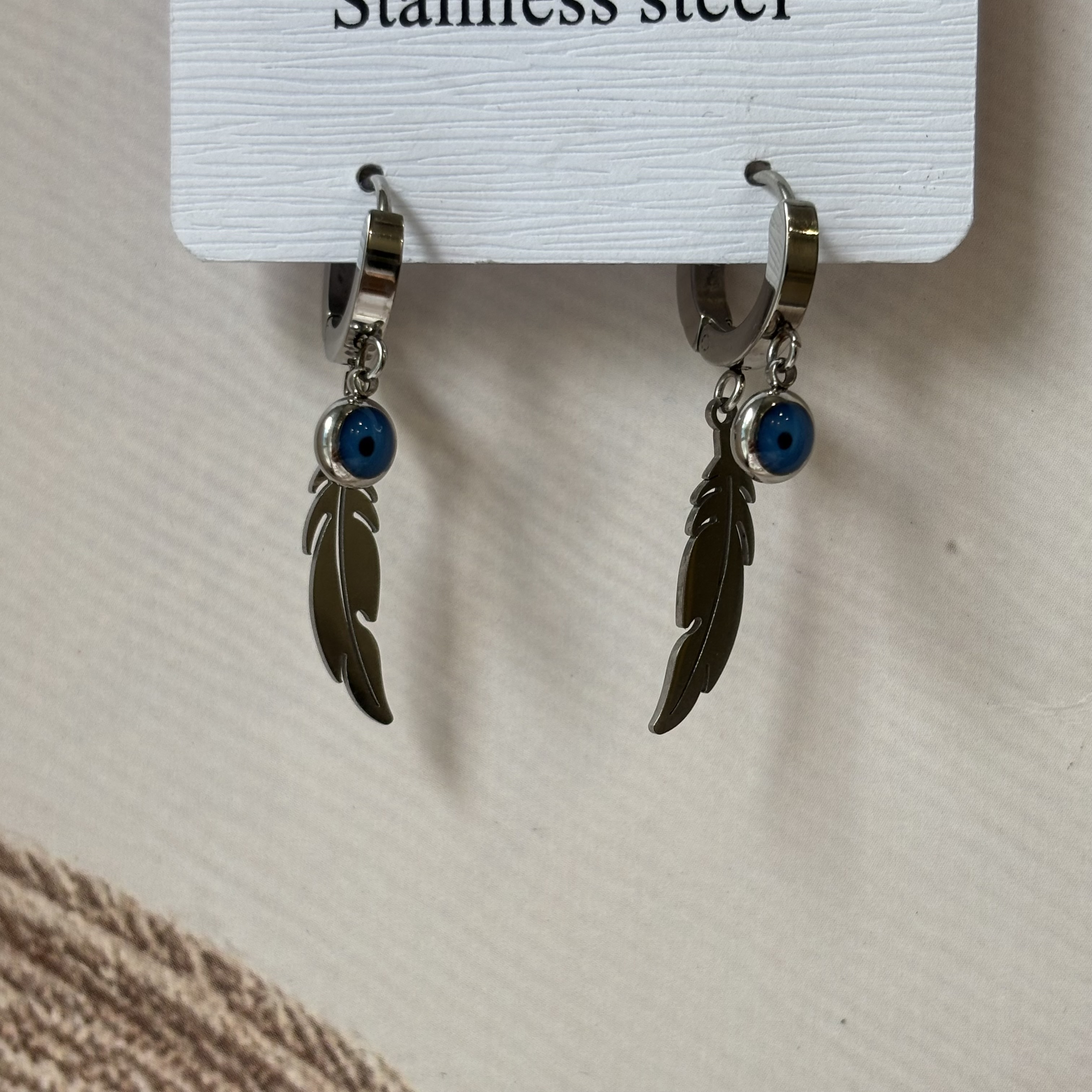 Evil eye feather drops